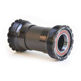 Wheels Manufacturing T47 inboard angular contact bearings for 24/22mm crank bottom bracket, shown installed in bike component.