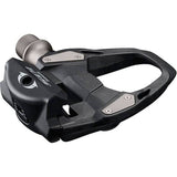 Shimano 105 PD-R7000 carbon black SPD-SL road pedals for 11-speed groupset, lightweight cycling component with clipless design.