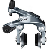 Shimano 105 BR-R7000 road bike brake calipers with 49mm drop and dual-pivot design, mounted on a racing bike wheel.