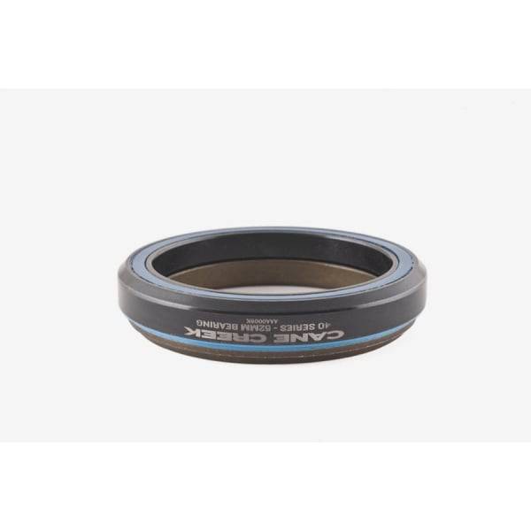 Black Cane Creek 40 IS52/40 bike headset with durable construction and smooth steering, shown from the side.