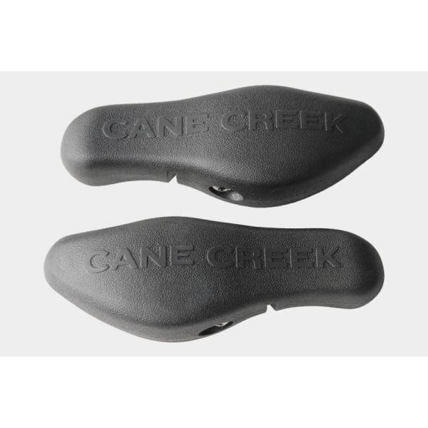 Cane Creek Ergo Control black bar end for ergonomic cycling handlebars, providing comfort and precise control.