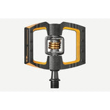Crankbrothers Mallet DH 11 downhill pedals in black and gold with adjustable release angle, suitable for mountain biking components.