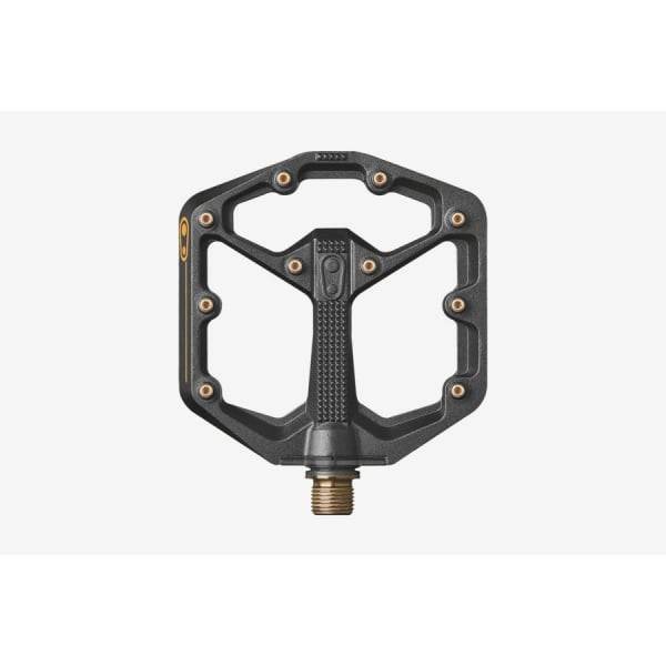 Crank Brothers Stamp 11 flat mountain bike pedal with adjustable pins, durable black metal components, and textured grip surface.