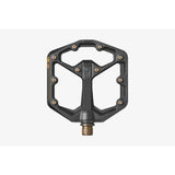 Crank Brothers Stamp 11 flat mountain bike pedal with adjustable pins, durable black metal components, and textured grip surface.