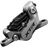 Shimano XTR BR-M9120 4-pot hydraulic disc brake calipers for front and rear post mount mountain bike components.