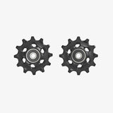 SRAM XX1/X01 Eagle 12-speed rear derailleur pulley kit with black upper 12T and lower 14T pulleys, bike components for smooth shifting.