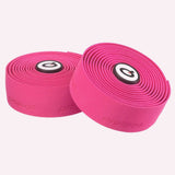 Prologo Plaintouch cork bike handlebar tape with self-adhesive backing and end caps for comfortable grip and control.