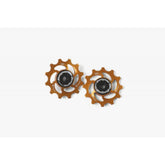 Hope 12-tooth jockey wheels pair for bike drivetrain, showing metal components and smooth gear engagement for efficient cycling.