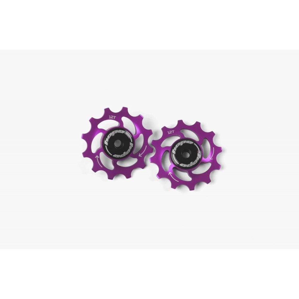 Hope 12-tooth jockey wheels pair for bike drivetrain, showing sleek metal components designed for smooth gear shifting.