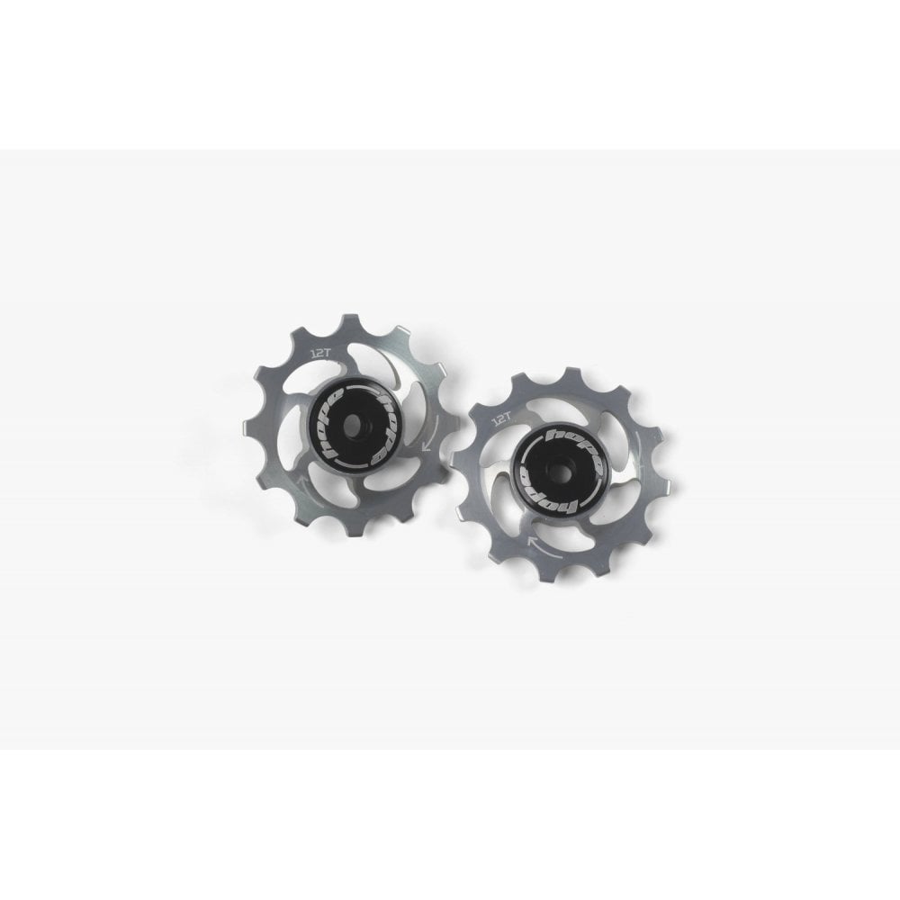 Hope 12-tooth jockey wheels pair for bike drivetrain, showing durable metal components and smooth spinning design.