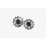 Hope 12-tooth jockey wheels pair for bike drivetrain, showing durable metal components and smooth spinning design.
