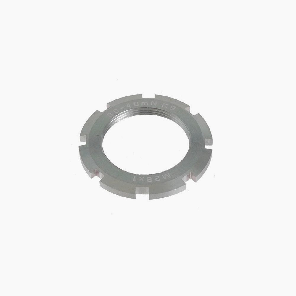 Specialites TA Vega and Carmina lockring spare parts and accessories for bike cranksets, shown on a white background.