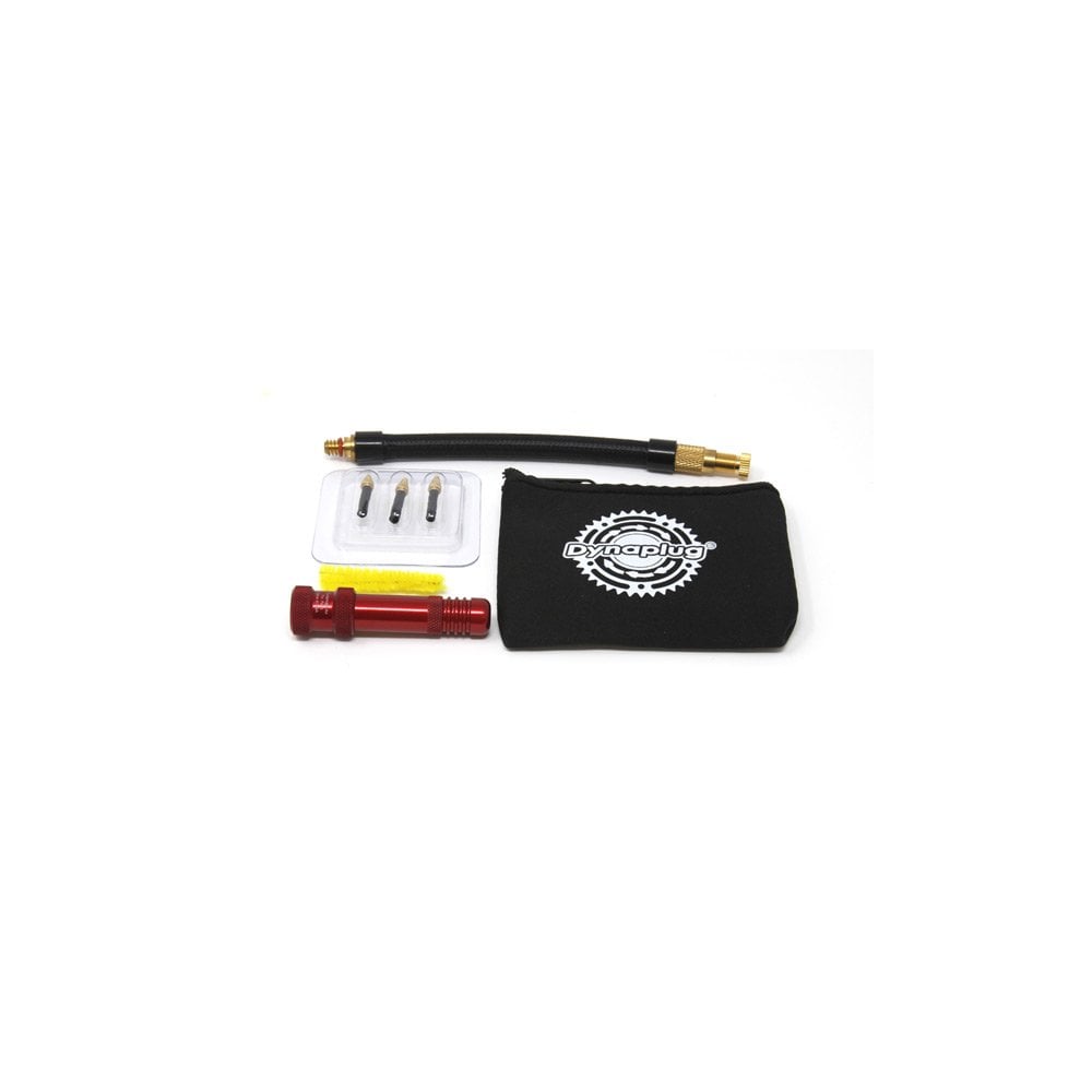 Dynaplug Air tubeless MTB tyre repair kit with CO2 cartridge, includes tools for inflating and sealing MTB tires.
