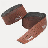 Deda Elementi leather look bar tape for bicycle handlebars, offering a comfortable grip and vibration absorption.