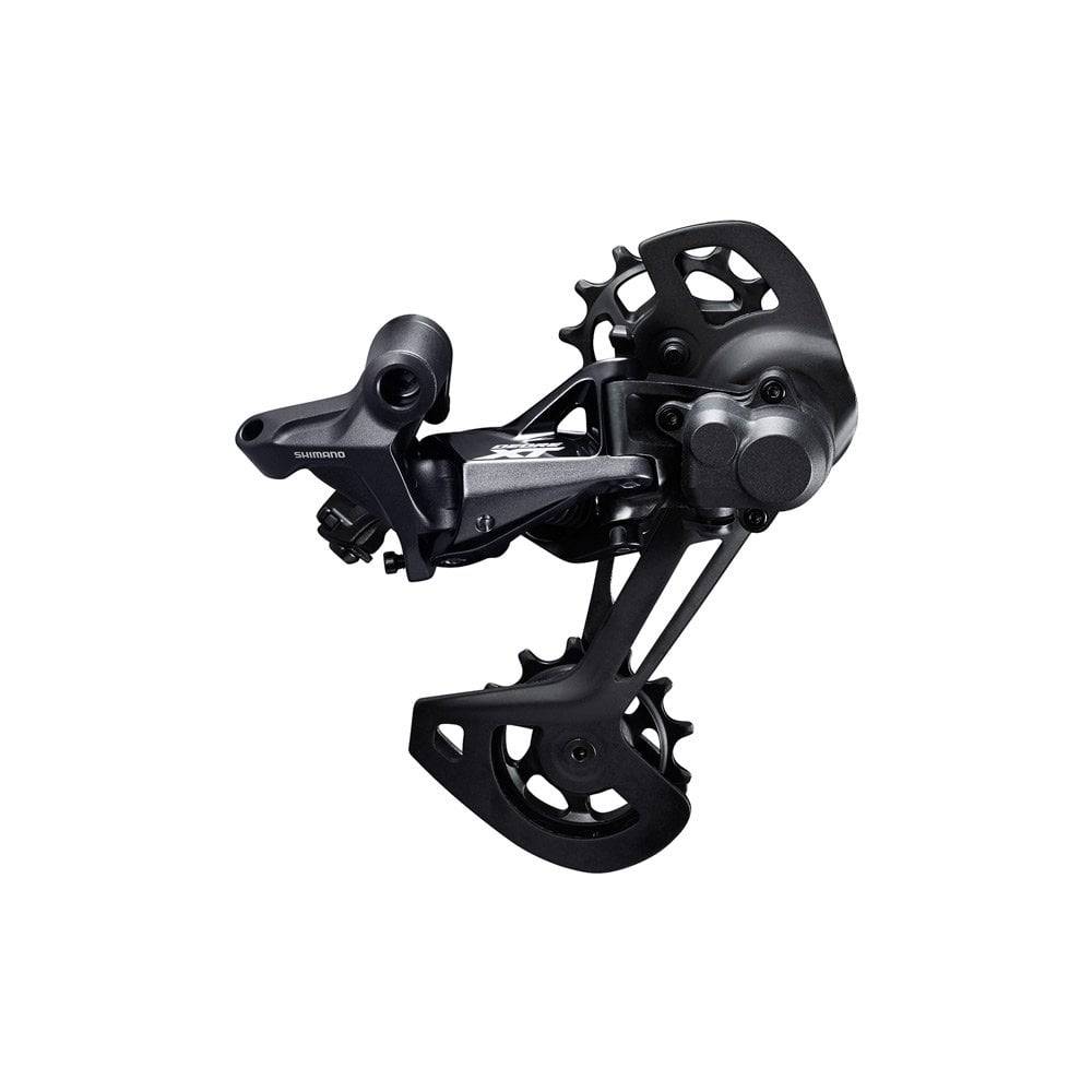 Shimano Deore XT RD-M8120 12-speed MTB rear derailleur with Shadow+ SGS design, mounted on a bicycle drivetrain.