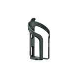 Topeak Ninja Cage black water bottle holder mounted on a cycling bike frame, accessory designed for secure hydration carrying.