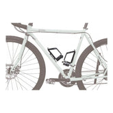 Black Topeak Alt-Position Bottle Cage Mounts on a bike frame for adjustable hydration bottle attachment.