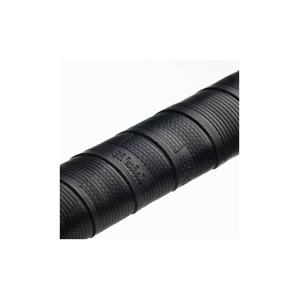 Fizik Vento Solocush Tacky cycling handlebar tape, lightweight and non-slip, wrapped around a bike handlebar for secure grip.