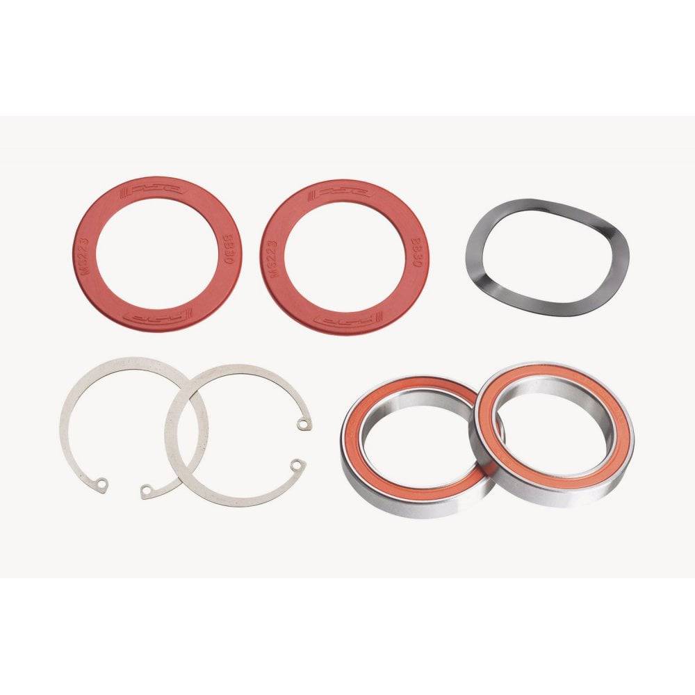 FSA BB30 Road Ceramic Bottom Bracket with bearings and installation accessories for high-performance bicycle components.