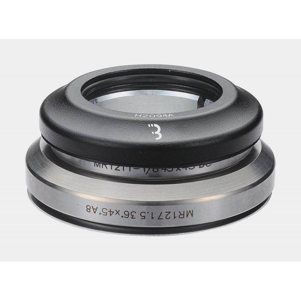 BBB BHP-46 tapered 1.1/8-1.5 headset with 8mm cap for smooth steering, bicycle component showing the headset and cap assembly.