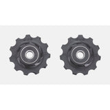 Black BBB BDP-02 RollerBoys 11T jockey wheels for Shimano and SRAM rear derailleurs, shown mounted on a bike derailleur.