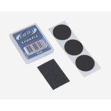 BBB BTL-80 LeakFix Patches self-adhesive tube repair kit with sandpaper, shown in six-pack for bicycle or workshop repairs.
