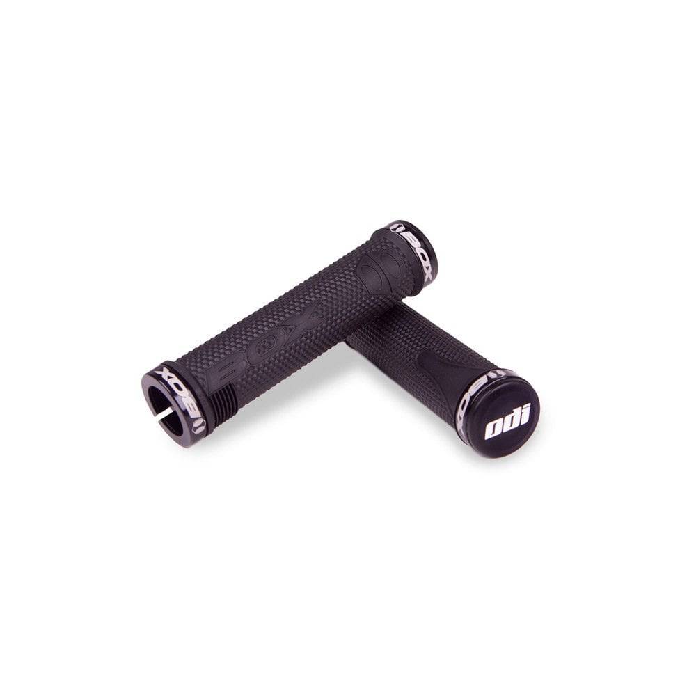 Black ODI BMX lock-on grips with 130mm length, snap cap end plugs, and clamps, designed for secure bike handlebar control.