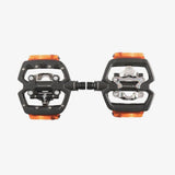 LOOK Geo Trekking Vision pedals with clipless and flat sides, featuring built-in VISION lights for cycling components.