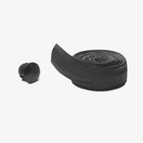 Selle San Marco Bottega real leather handlebar tape for road bikes, showcasing textured brown leather and ergonomic wrapping