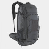 EVOC FR Trail E-Ride Protector Backpack with hydration bladder and battery compartment, designed for mountain biking accessories.