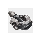 Shimano Deore XT PD-M8100 XC Race SPD pedals with adjustable tension and mud shedding for mountain biking.