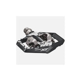 Shimano Deore XT PD-M8120 Trail Wide SPD pedals for off-road riding, showing durable metal clips and wide pedal platform.