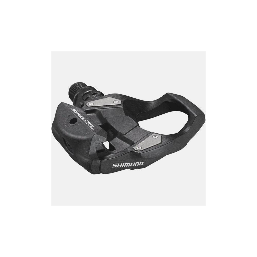 Shimano PD-RS500 SPD-SL road bike pedals with resin composite body and black finish, shown with cleats attached.