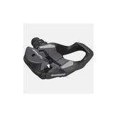 Shimano PD-RS500 SPD-SL road bike pedals with resin composite body and black finish, shown with cleats attached.