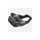 Shimano PD-RS500 SPD-SL road bike pedals with resin composite body and black finish, shown with cleats attached.