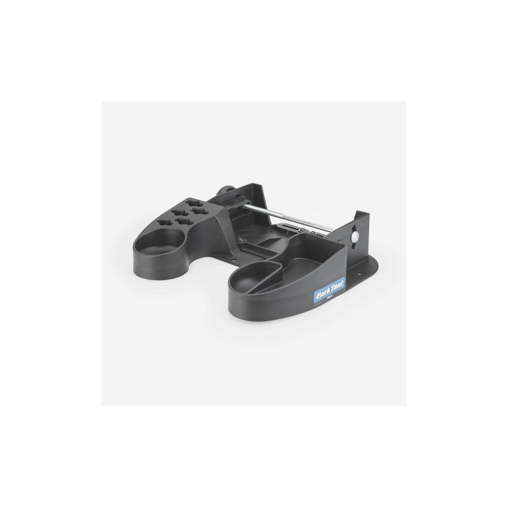 Park Tool TSB-2.2 tilting truing stand base for TS-2, TS-2.2, and TS-2.3 wheel stands in a workshop setting