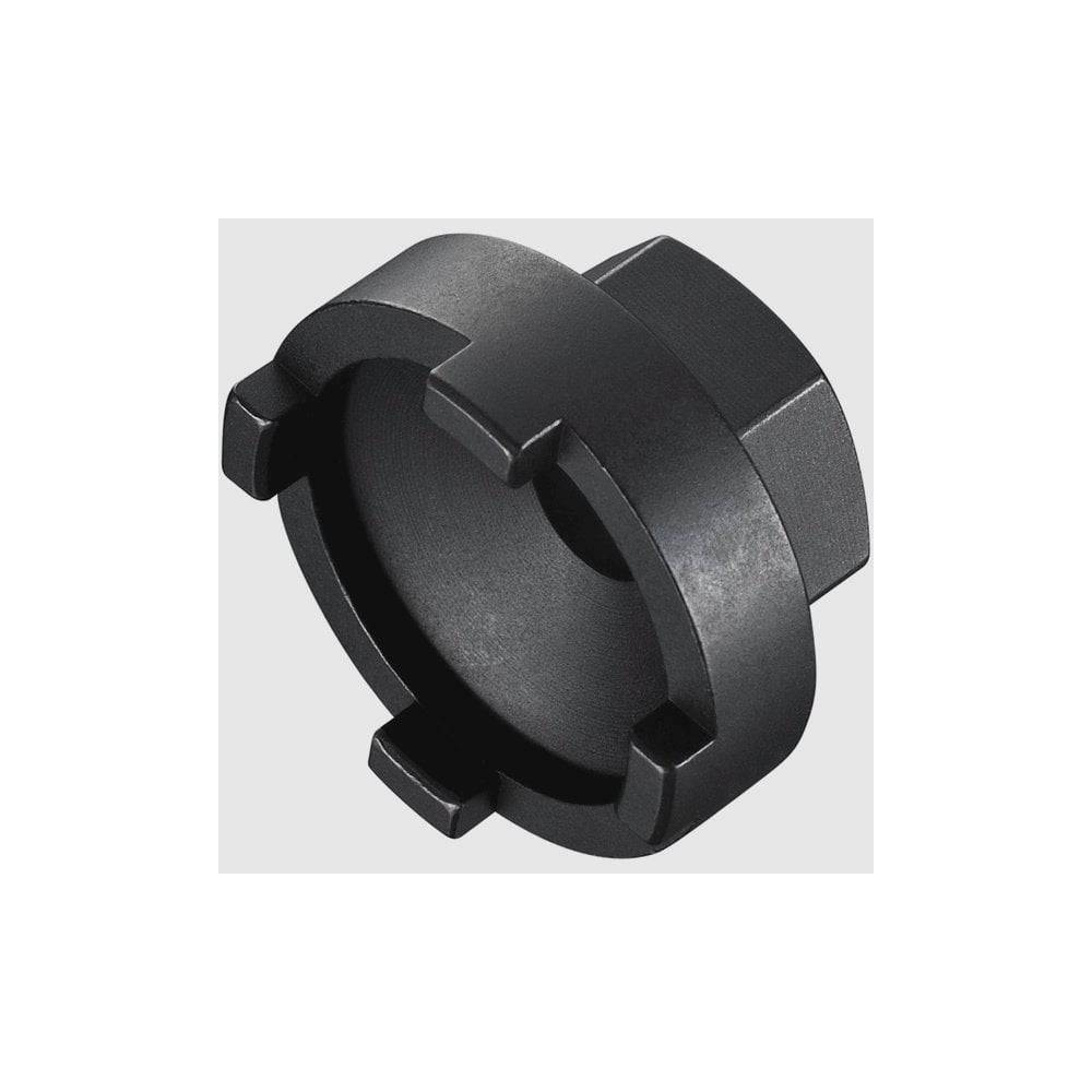 Shimano TL-FW45 BMX freewheel removal tool for SF-MX30 rear hubs, shown in a workshop setting with tools and bike components.