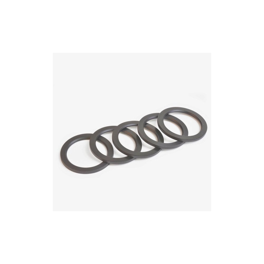 Wheels Manufacturing 29mm ID x 2.5mm crank spindle spacers for SRAM DUB cranks, set of five shown in the image.