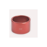 Wheels Manufacturing 44mm sleeve for sealed bearing extractor cup in a workshop setting, used for bicycle bearing removal.