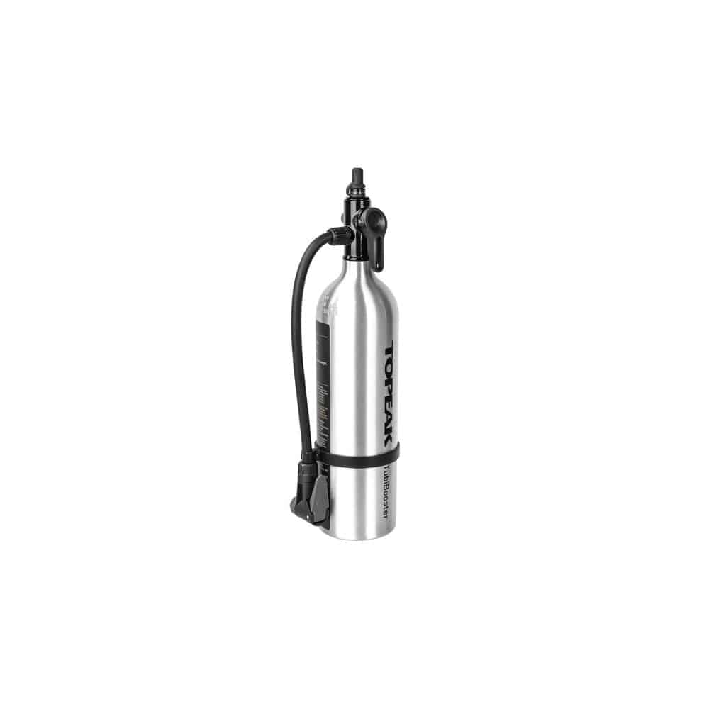 Topeak Tubibooster X Silver tubeless tyre inflator with Presta and Schrader valve compatibility, close-up view of the accessories.