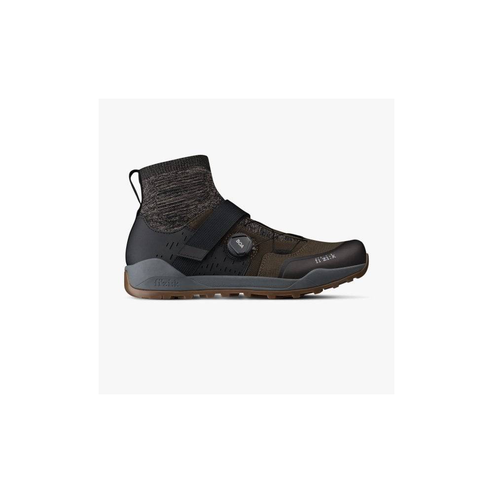 Fizik X2 Terra Clima waterproof mountain bike shoes with breathable mesh and rugged soles for MTB riding.