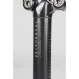 Cane Creek Thudbuster ST G4 suspension seatpost with 50mm travel for mountain bikes, showing the adjustable suspension mechanism.