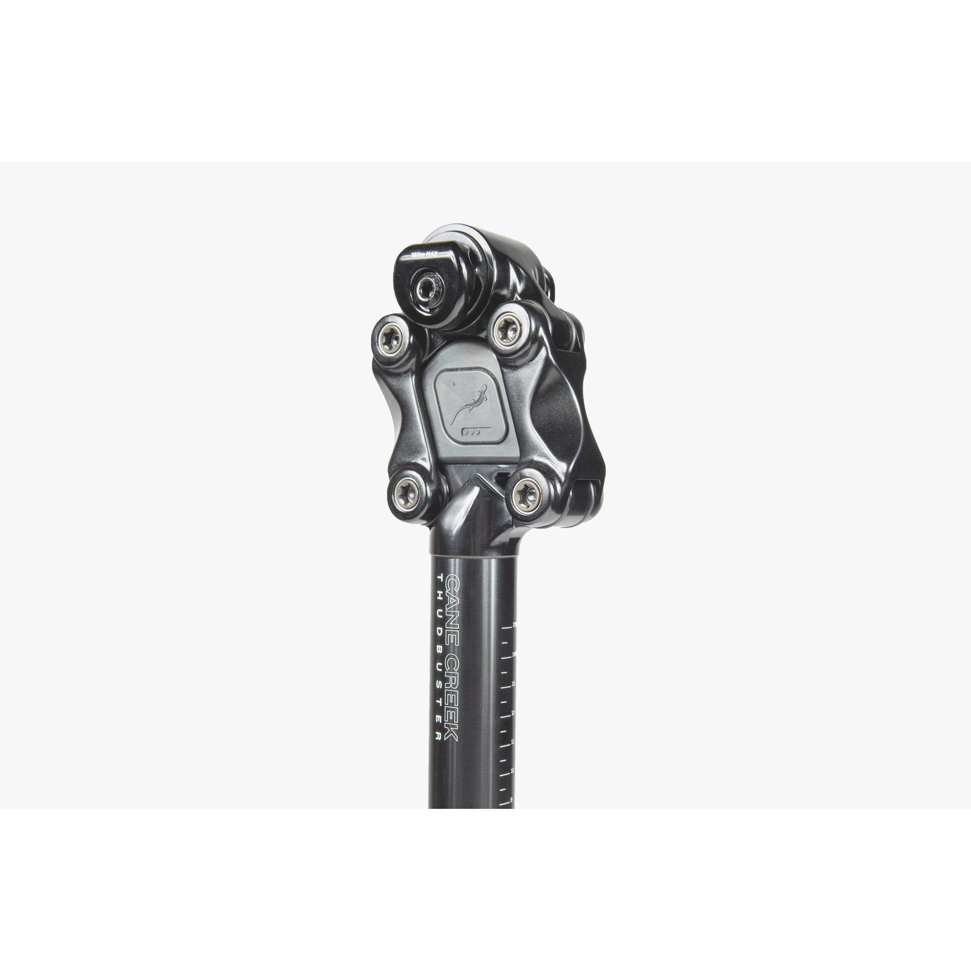 Cane Creek Thudbuster ST G4 suspension seatpost with 50mm travel for mountain bike components, shown mounted on a bike seat.