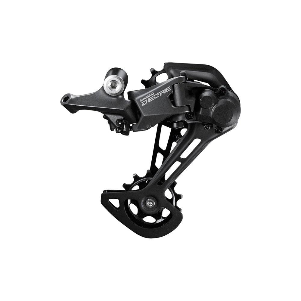 Shimano Deore RD-M5100 11-speed MTB rear derailleur with Shadow+ technology and long cage, mounted on a mountain bike.
