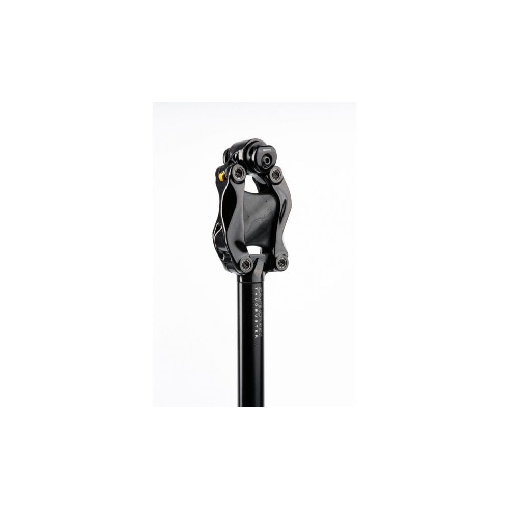 Cane Creek Thudbuster LT G4 suspension seatpost with tool-free elastomer adjustment, shown with adjustment tool.