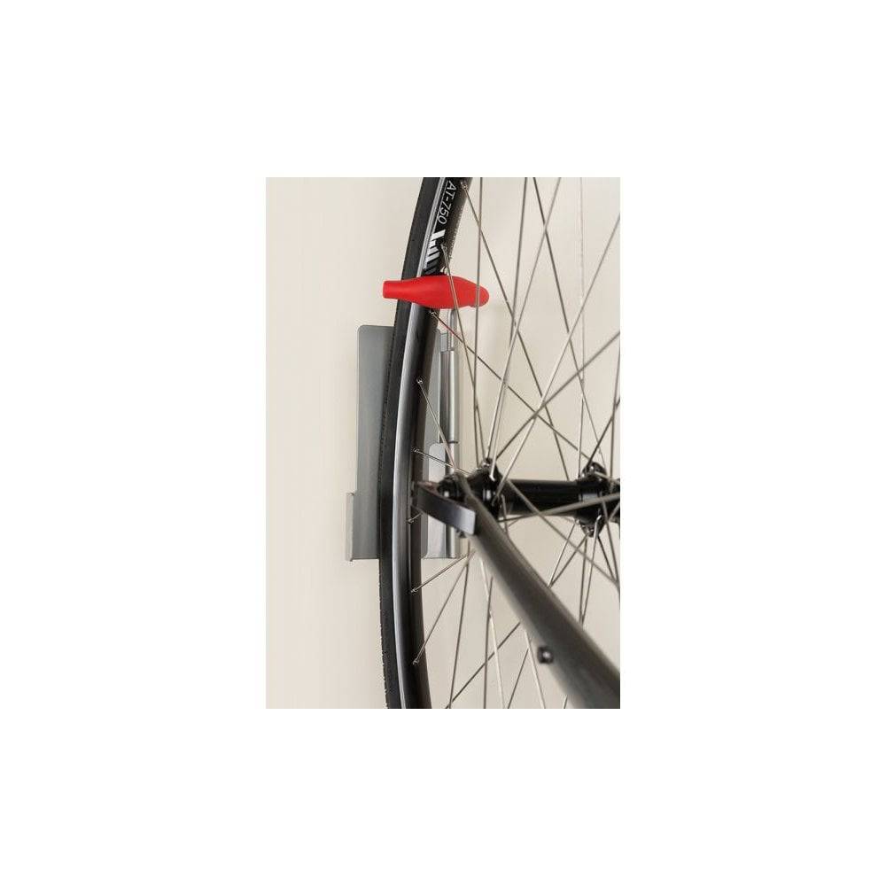 Delta hinged single bike hook in black with rubber arm protection for vertical bike storage, durable accessories for bike organization