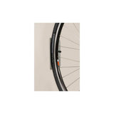 Delta black hinged single bike hook with rubber arm protection for vertical bike storage, accessory for secure bike hanging.