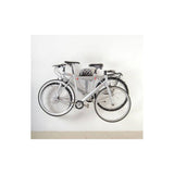 Delta Pablo wall mount bike rack in silver and black with folding design and shelf, showcasing a functional bike storage accessory.