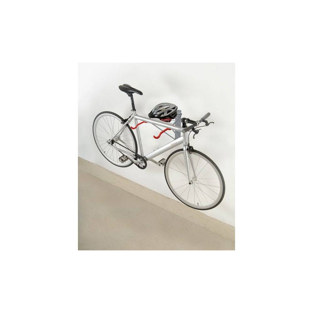 Delta Pablo wall mount bike rack in silver and black with folding design and shelf for convenient bike storage and organization.