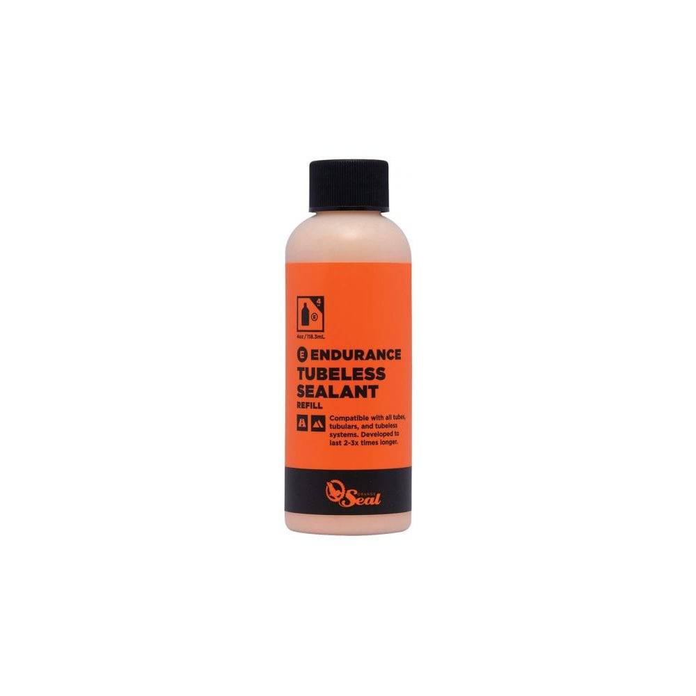 Orange Seal Endurance tubeless sealant in a container, designed for puncture protection and cold weather use on bike wheels.